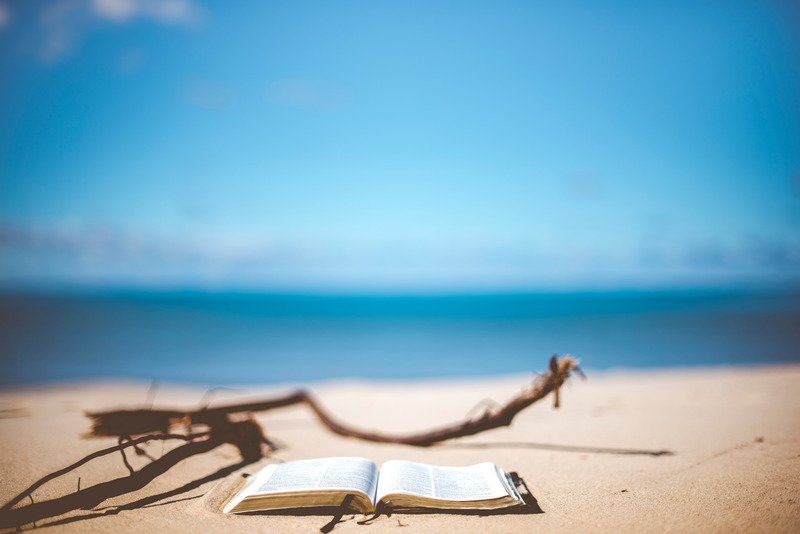 An open book on a beach