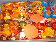 Fall Sensory Tray with Leaves and Pumpkins