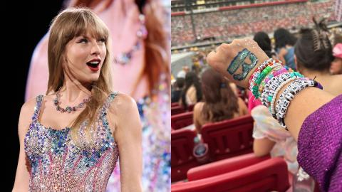 Taylor Swift and a fan's hand wearing friendship bracelets